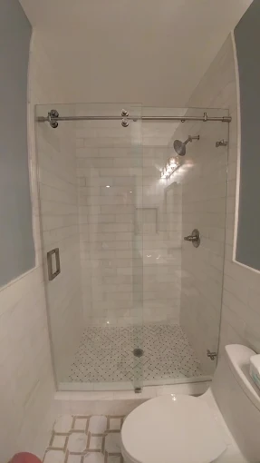Clean frameless glass shower door